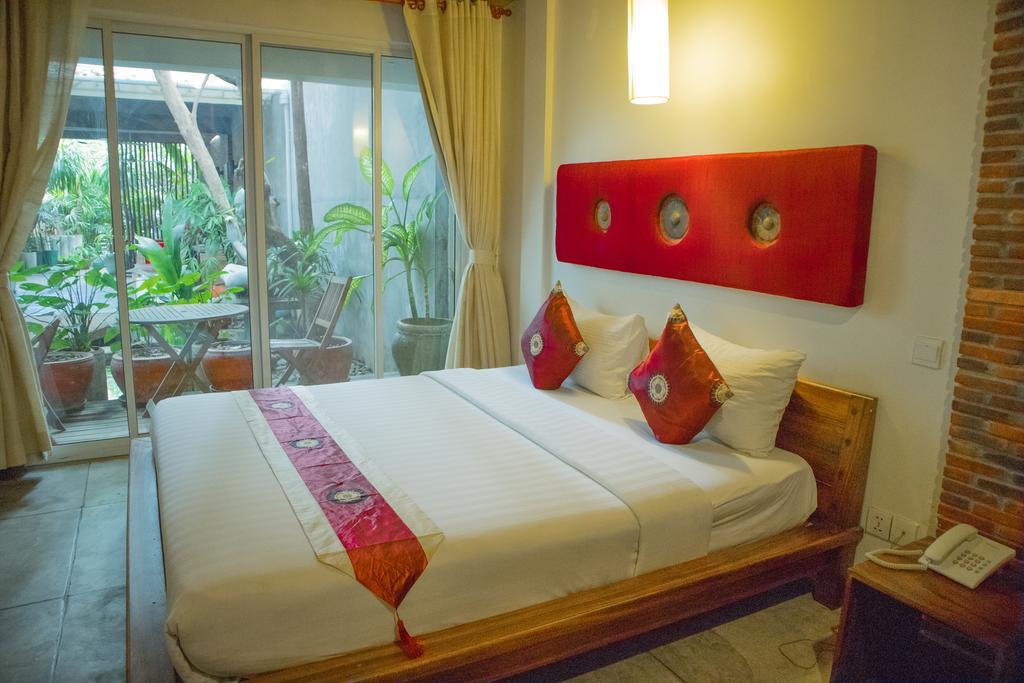 Casa Villa Independence Phnom-Penh Kamer foto